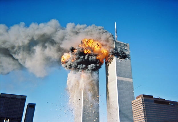 The attack on the Twin Towers in 2001, which initiated the US-led Global War on Terror.